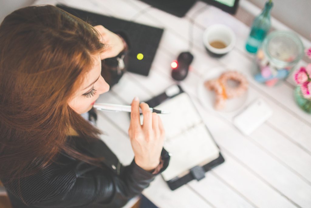 alignthoughts-woman-hand-desk-office